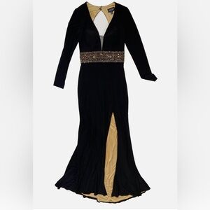 Xscape, Gown in black with gold embellishments,